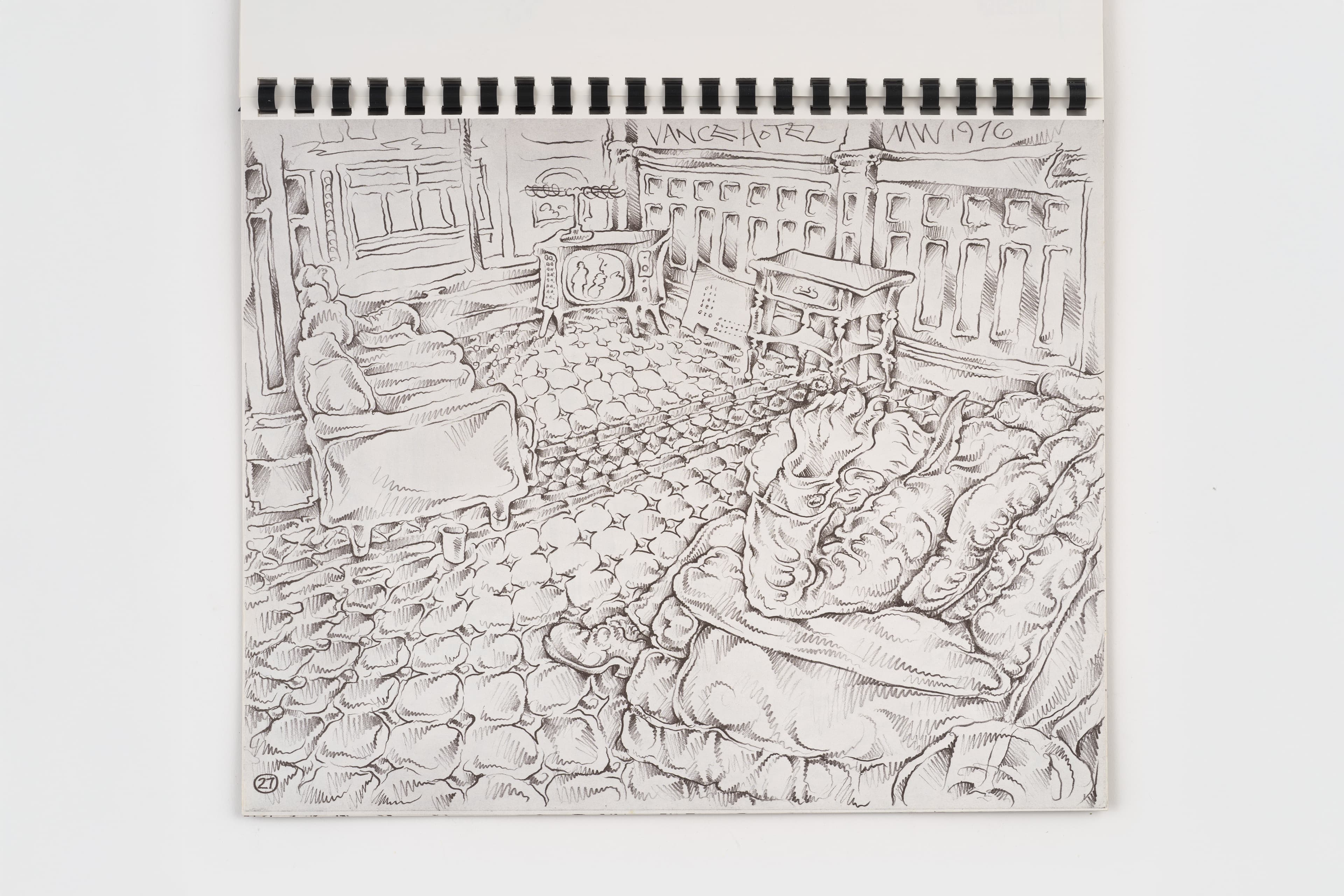 A black-and-white spiral-bound sketchbook page containing a detailed ink-and-pencil perspective drawing titled "Vance Hotel." The drawing captures a cluttered, highly patterned hotel room interior. In the foreground to the right, a large, sofa with a man sitting on it, his back towards the viewer while cradling his head. The style looks like quilted blankets. The floor is covered in a dense, cobblestone-like circular pattern that extends toward a sofa on the left and a retro television set in the far corner. At the top edge of the drawing, the artist has handwritten "MW 1976."
